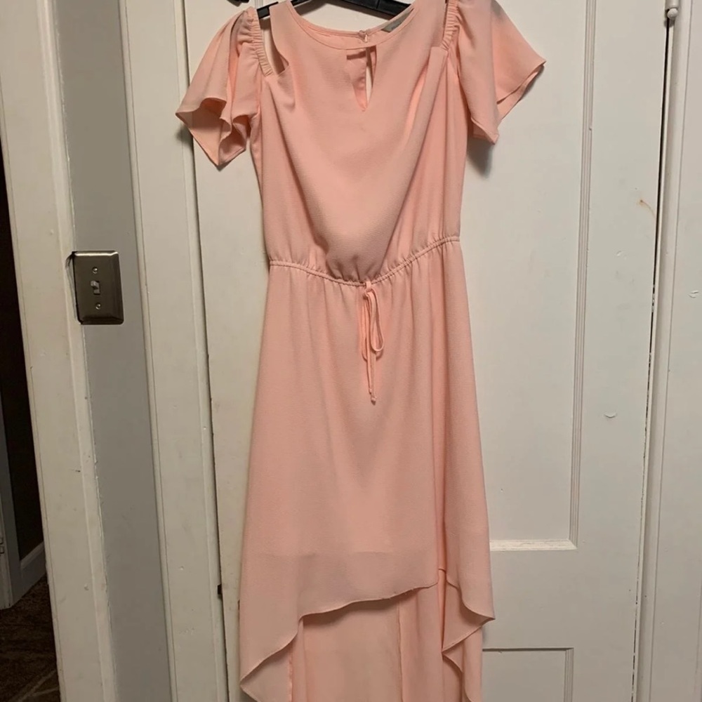 Woman’s peach  belle and sky open shoulder dress